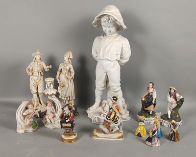 many figurines that are sitting on a table
