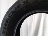 tire tread of a car on a white surface with a white background