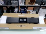 a box that has a speaker in it on a table