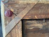 a piece of wood that has been cut in half with a knife