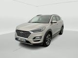 a white suv is parked in a white room