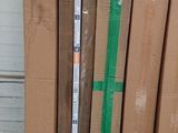 a lot of boxes and a measuring tape on the floor