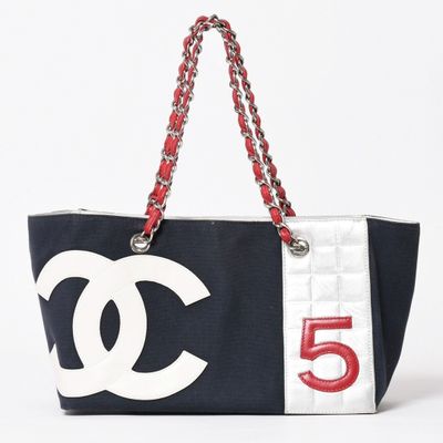 chanel black and white canvas tote bag with red chain handles