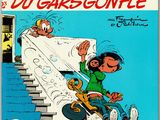 a cartoon book with a cartoon character riding a skateboard down a flight of stairs