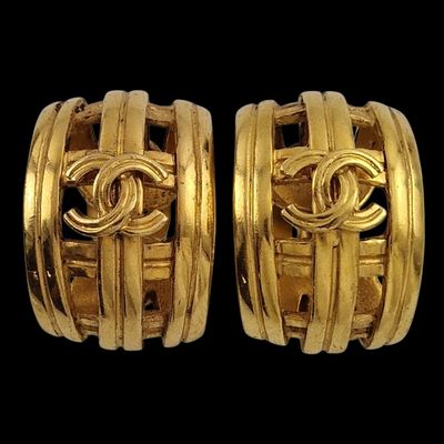 two pairs of gold toned chanel hoop earrings