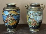 two vases sitting side by side on a table