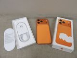a box with a phone and a mouse in it