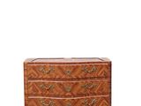 an antique chest of drawers with a wooden top