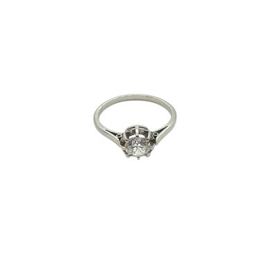 a close up of a diamond ring on a white background