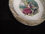 a plate with a picture of a woman on it