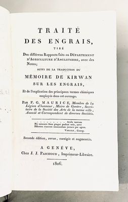 an open book on a table with writing on it