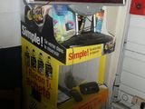 a vending machine with a sign on the front of it