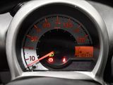 a close up of a speedometer in a car
