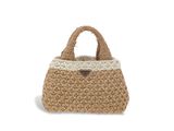 sac à main au crochet beige et blanc sur fond blanc