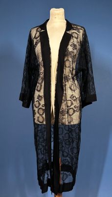 black and white lace coat on a mannequin mannequin mannequin mannequin mannequin mannequin mannequin mannequin mann