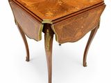 an image of a small table with a drawer on it