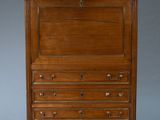 an antique walnut dresser with marble top