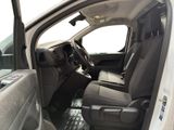 a view of the inside of a truck with the driver ' s seat down