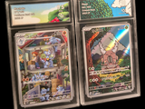three pokemon cards in a plastic case on display