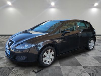 a picture of a black car in a garage