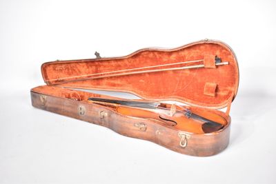 a violin case with a violin in it on a white surface