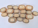 a lot of small wooden boxes with labels on them