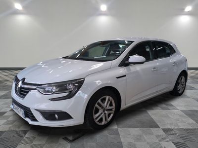 the white car is parked on a checkered tile floor