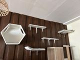 several shelves and shelves on the wall of a room