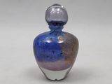 a blue and purple glass bottle with a silver base