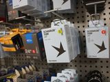 many items on the wall in the store for sale