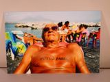 a picture of a man with a tattoo on his chest