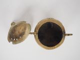 pair of antique brass candlesticks on a white background