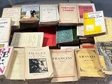 a lot of books that are on a table