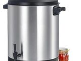 une photo d'un cuiseur à riz électrique en acier inoxydable à côté d'un pot de confiture