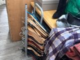 a pile of clothes sitting on top of a wooden table