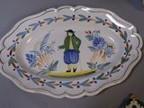 a plate with a picture of a man on it