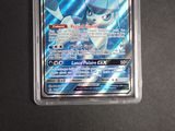 a close up of a pokemon card on a table