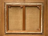 an old picture of a wooden frame with a cross on it
