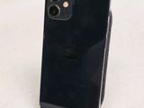 a black iphone that is sitting on top of a table