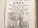 a book with a picture of a man holding a staff