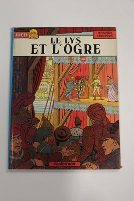 un vieux livre pour enfants illustré d'une scène de cirque