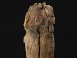 an image of a wooden sculpture of a man and a woman