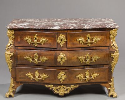 an antique chest of drawers with a marble top and gold accents