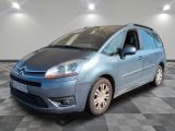a picture of a blue citrole parked in a showroom