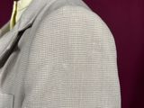 a mannequin wearing a suit and tie on a mannequin mannequin mannequin mannequin mannequin mannequin mann