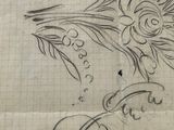 drawing of a flower and a bird on a piece of paper