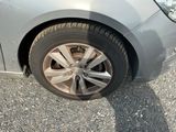 a close up of a car ' s tire on the road