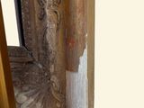 a picture of a door that has a gold door handle on it