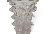 a clear glass vase with a design on it