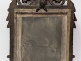 a picture of a small mirror on a stand